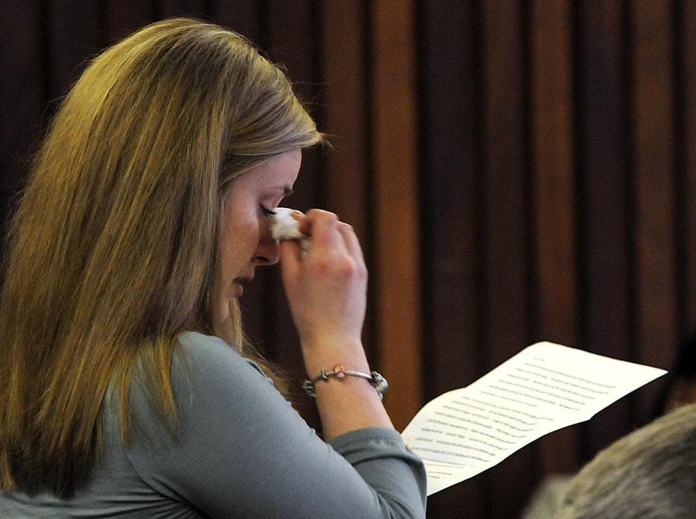 Kayla Narey reads a statement as she admits to sufficient facts of criminal harassment during her hearing in Franklin - Hampshire Juvenile Court in Northampton. Mass., Wednesday. (AP)