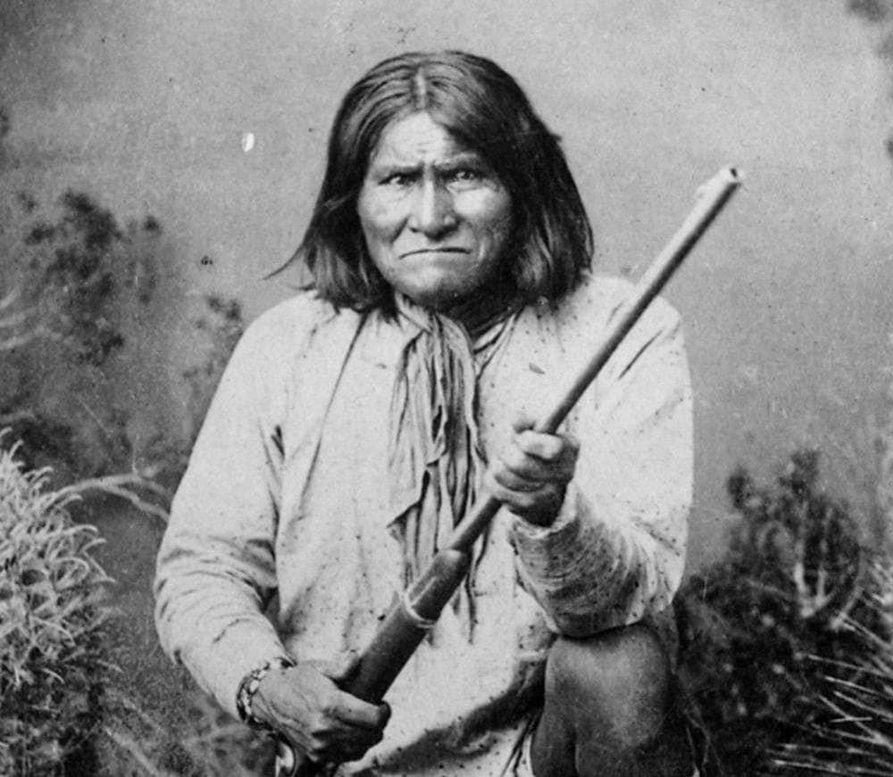 The famed Indian warrior Geronimo, a Chiricahua Apache, poses with a rifle in this 1887 photo. (AP/National Archives)