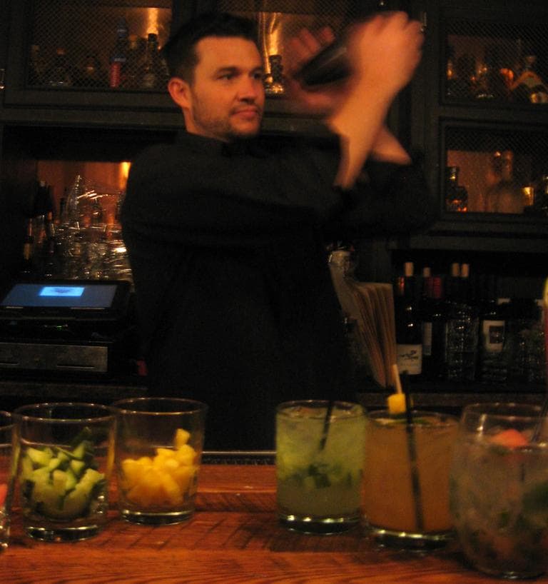 Josh Jamison makes a margarita at Lolita Cocina and Tequila Bar. (Anna Pinkert for WBUR)