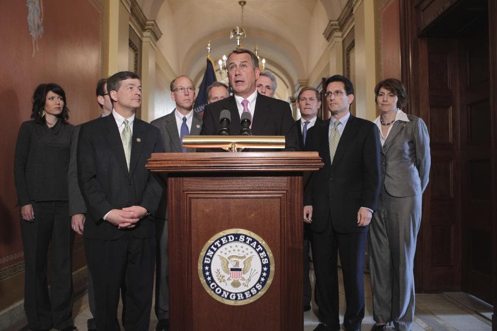 House Speaker John Boehner of Ohio, center, accompanied by fellow Republicans, speaks on Capitol Hill in Washington, Monday. (AP)