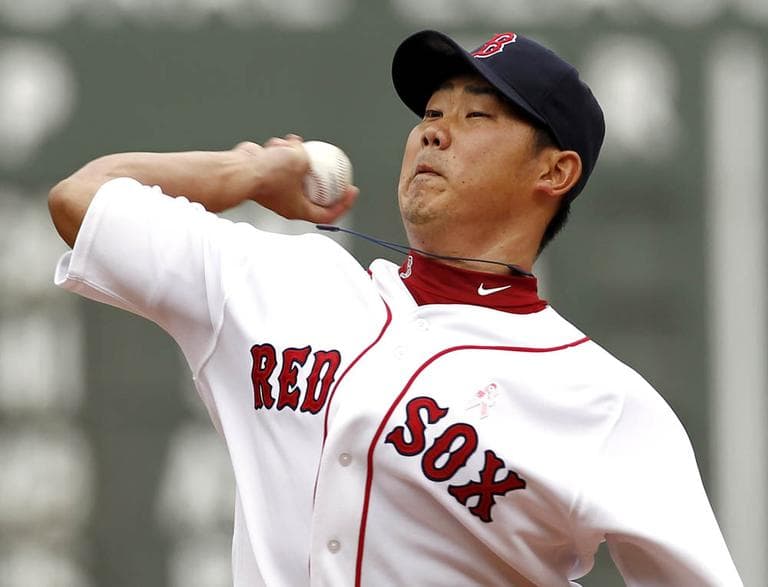 Boston Red Sox starting pitcher Daisuke Matsuzaka delivers against the Minnesota Twins at Fenway Park, Sunday. (AP)