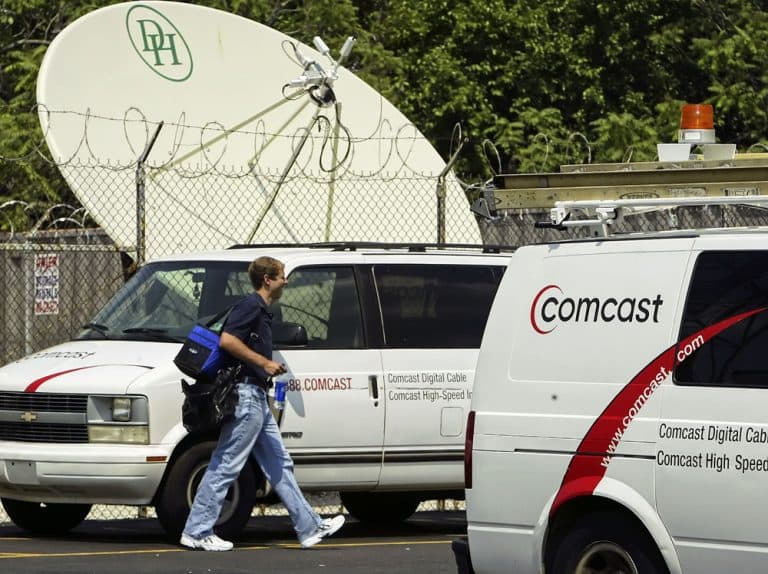 Comcast, the nation's largest cable television operator, at work (AP) 