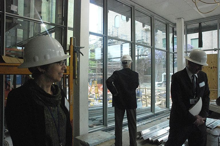 Three of the Gardner&#039;s curators give a tour of the construction at the museum. (Andrea Shea/WBUR)