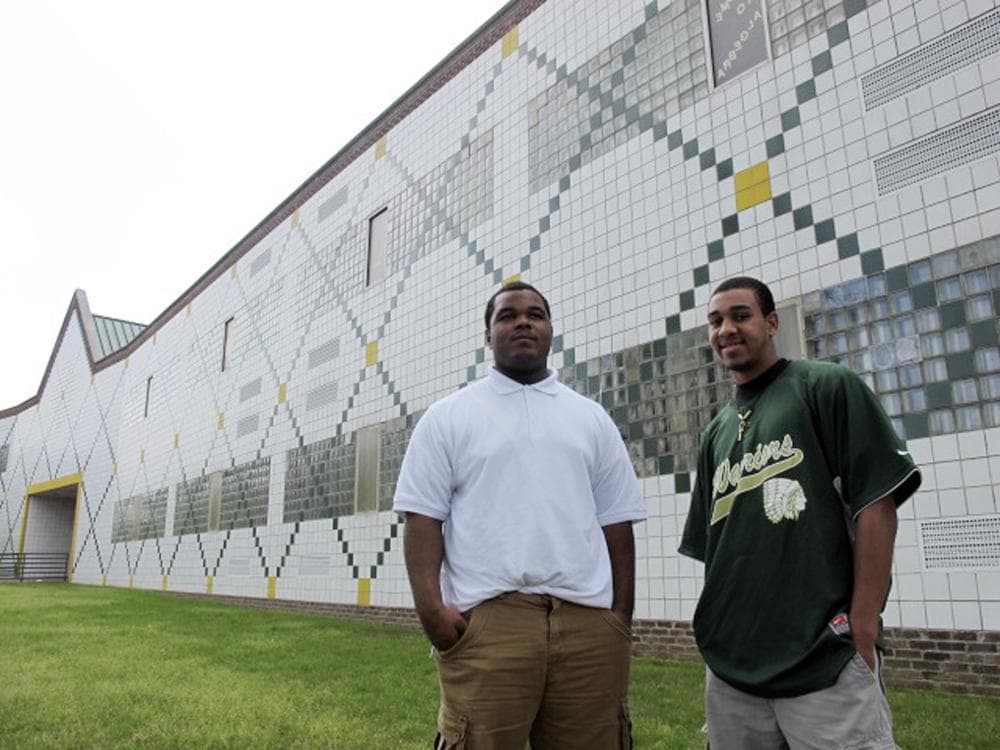 Darrien Little, left, and Kenneth Roberson stand outside Booker T. Washington High School in Memphis, Tenn. The teens are two of several Booker T. Washington seniors who worked on a video project as part of President Barack Obama's Race to the Top Commencement Challenge to win a presidential visit. (AP)