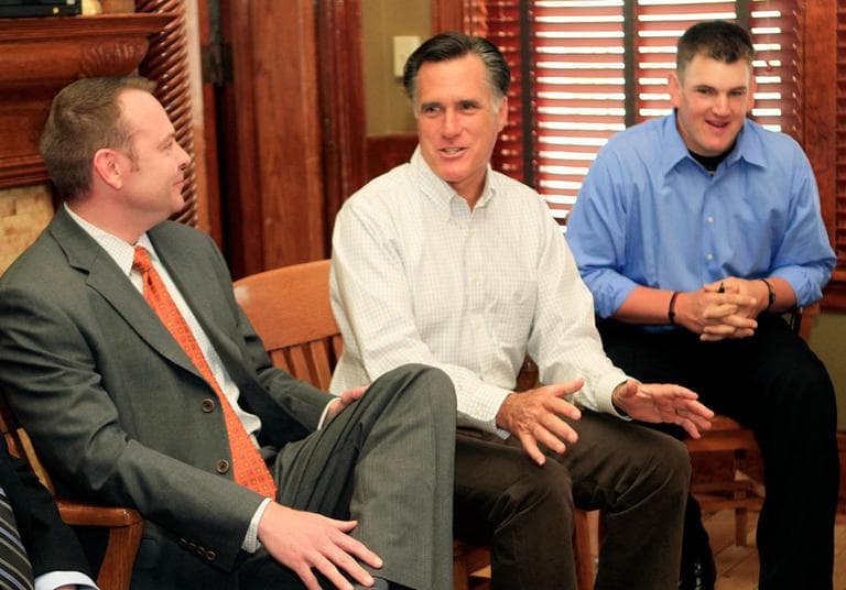 Likely Republican presidential hopeful and former Gov. Mitt Romney, center, talks with business leaders in Nashua, N.H., on May 3. (AP)