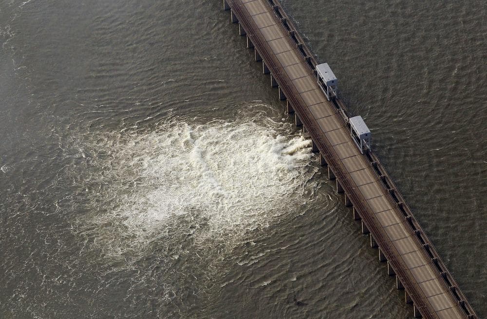 Water diverted from the Mississippi River spills through a bay in the Morganza Spillway in Morganza, La. (AP)