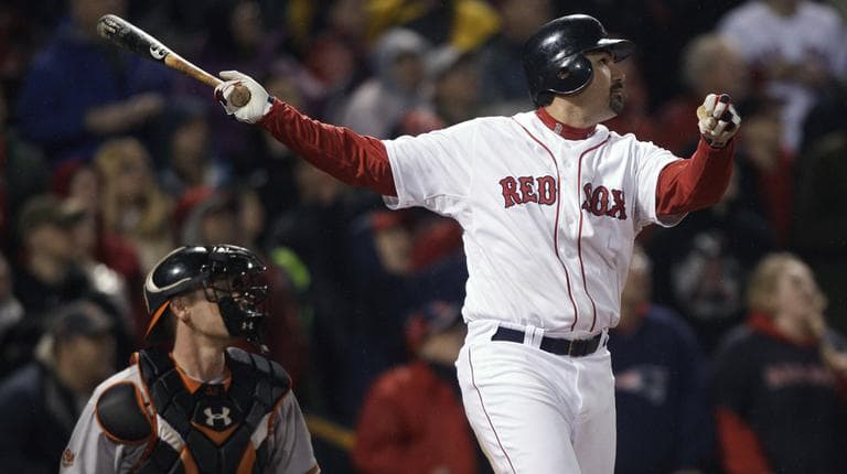 Boston Red Sox&#039;s Adrian Gonzalez hits a two-run double in the ninth inning against the Baltimore Orioles on Monday, May 16, 2011. (AP)
