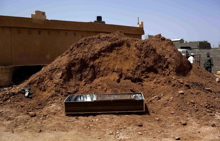 An empty coffin is seen after a funeral of a rebel fighter at a cemetery in Benghazi, Libya, Tuesday. (AP)