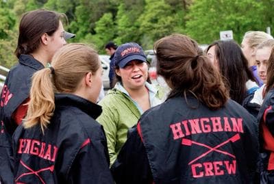 Kim Laughlin speaks to her team members on the Hingham crew team. (Jesse Costa/WBUR)