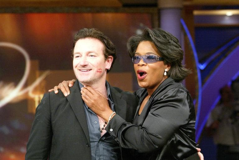 Bono, left, appeared on &quot;The Oprah Winfrey Show&quot; in 2002. ((c) Harpo, Inc./George Burns)