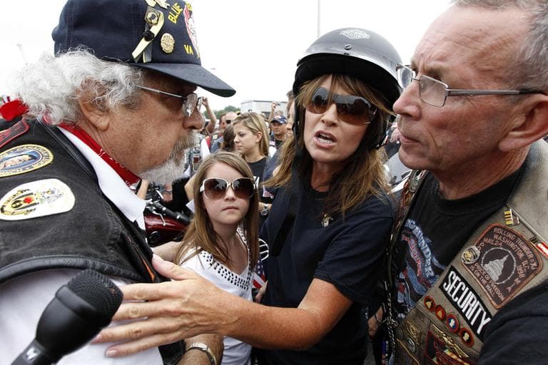 Sarah Palin, former GOP vice presidential candidate and Alaska governor, with her daughter Piper, center, at the beginning of Rolling Thunder at the Pentagon Sunday, in Washington. (AP)