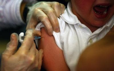 A young boy is vaccinated against MMR in Scotland in 2007.