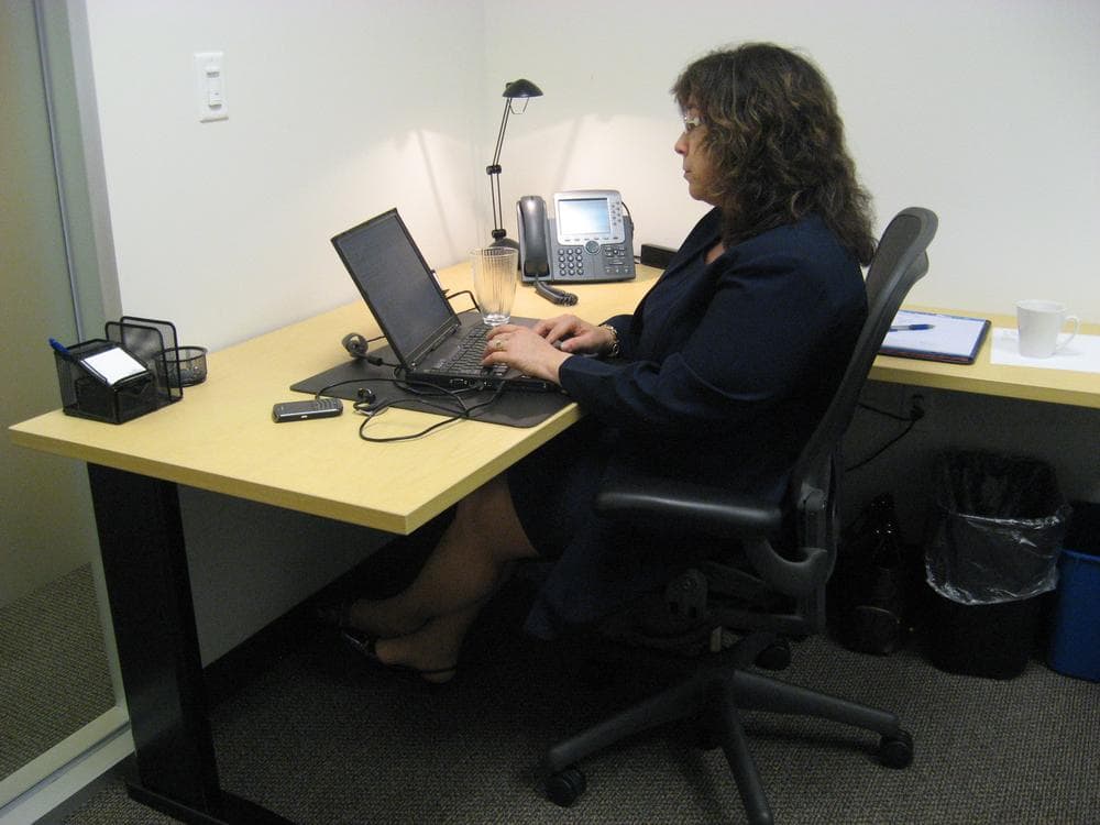 Deuteria Pharmaceuticals CEO Sheila DeWitt runs her one-woman drug company from office space she rents for $99/mo. in Andover. (Curt Nickisch/WBUR)