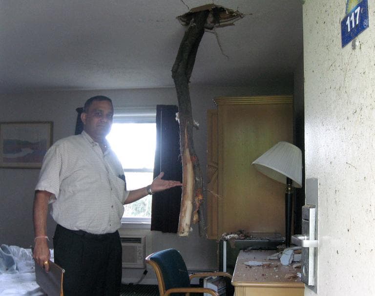 Days Inn owner Jay Patel shows off the only motel room he&#039;s looked in so far &mdash; he&#039;s waiting for the insurance company for the rest. (Sacha Pfeiffer/WBUR)