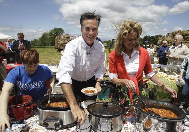 Former Gov. Mitt Romney and his wife Ann, right, serve chili in Stratham, NH., Thursday. (AP)