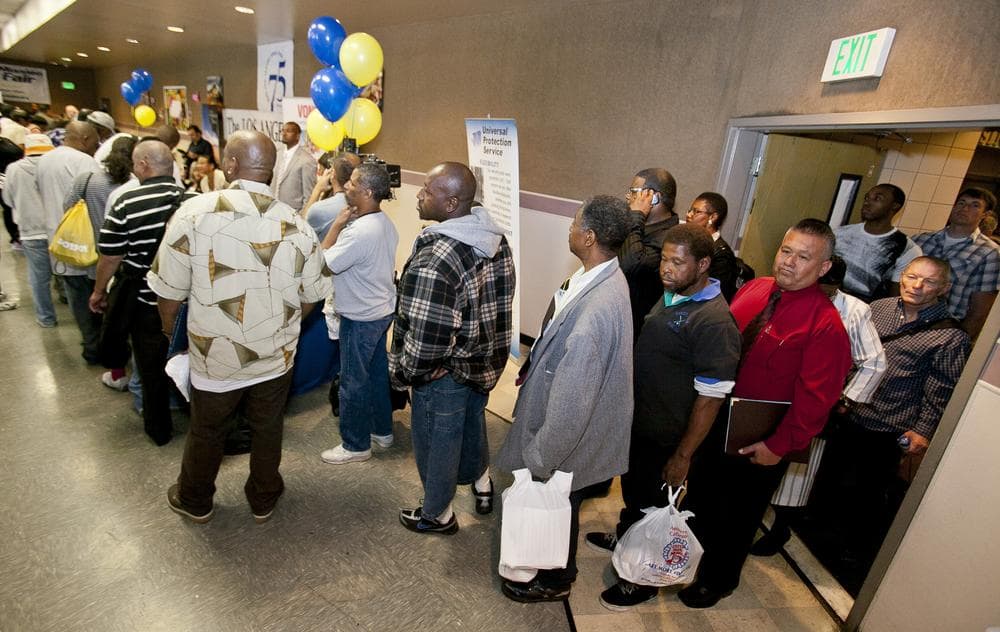 Job seekers line up at the 10th annual Skid Row Career Fair held at the Los Angeles Mission downtown Los Angeles Thursday. (AP)