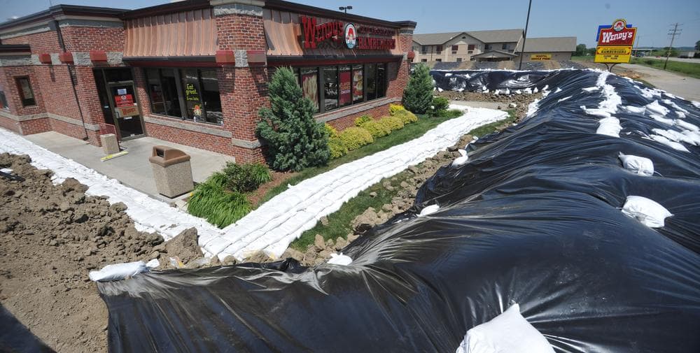 A restaurant is surrounded by a temporary berm in Hamburg, Iowa. The town is under a mandatory evacuation order as the Missouri River continues to rise. (AP)