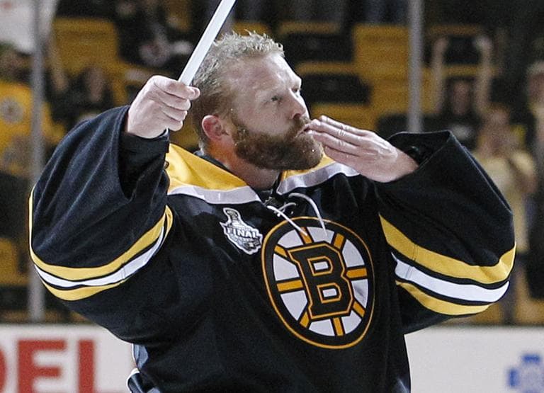 Bruins goalie Tim Thomas acknowledges fans at the end of the game after the Bruins beat the Canucks in Game 4 of the Stanley Cup finals, Wednesday. (AP)