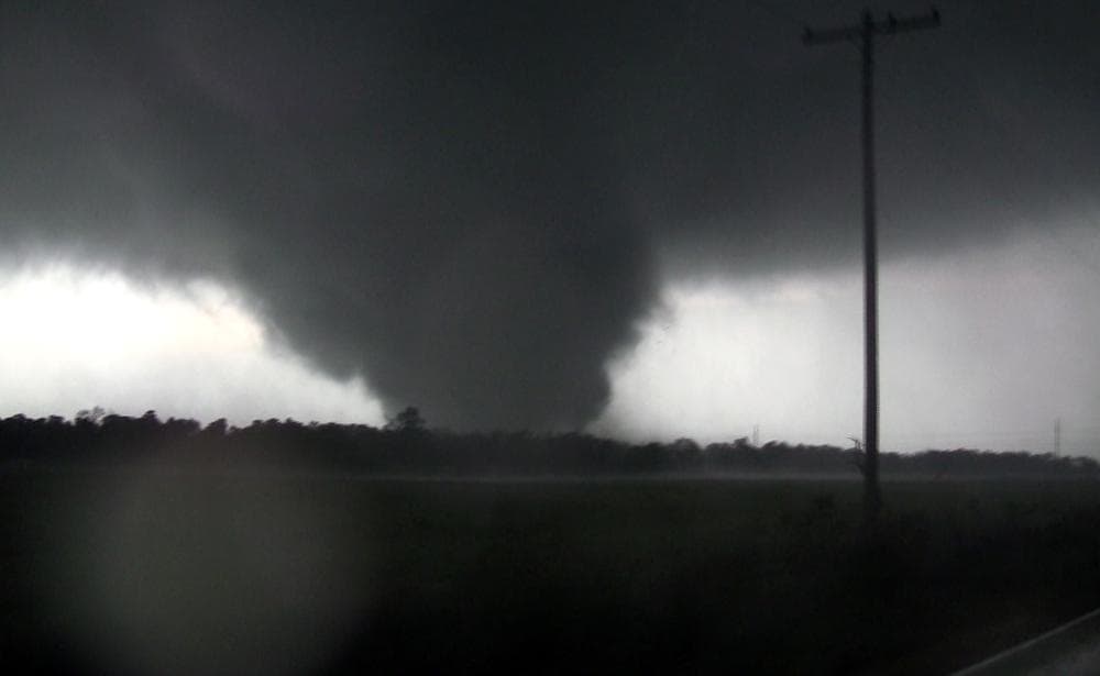This frame grab from video shows a massive tornado on May 22, 2011, outside Joplin, Mo.  The tornado tore a 6-mile path across southwestern Missouri killing at least 89 people. (AP/tornadovideo.net)