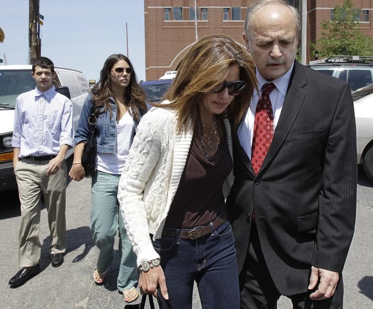 Former Massachusetts House Speaker Salvatore DiMasi walks with his wife Deborah and other family members after leaving the Federal  Courthouse in Boston, Wednesday afternoon. (AP)