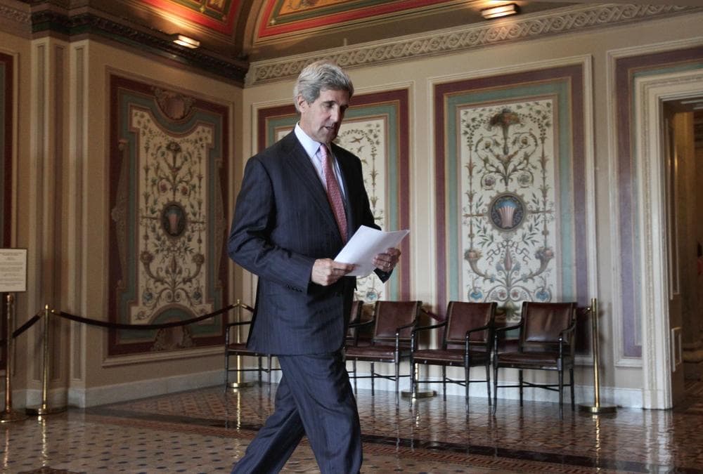 Senate Foreign Relations Committee Chairman Sen. John Kerry, D-Mass., walks to the floor of the Senate on Capitol Hill in Washington, Tuesday where he introduced a bipartisan resolution to authorize continued use of &quot;limited&quot; U.S. military force in Libya. (AP)