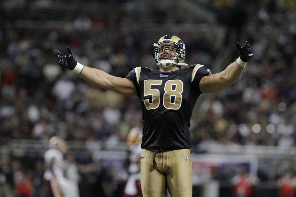 St. Louis Rams linebacker David Vobora works up the crowd in September 2010.  Last week, a federal judge awarded him $5.4 million in a lawsuit over tainted supplements. (AP)
