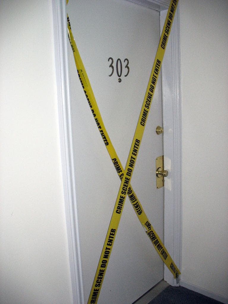 The door to James &quot;Whitey&quot; Bulger and Catherine Greig's apartment in Santa Monica where they were living underground for 15 years, is now wrapped in police tape. (Monica Brady-Myerov/WBUR)