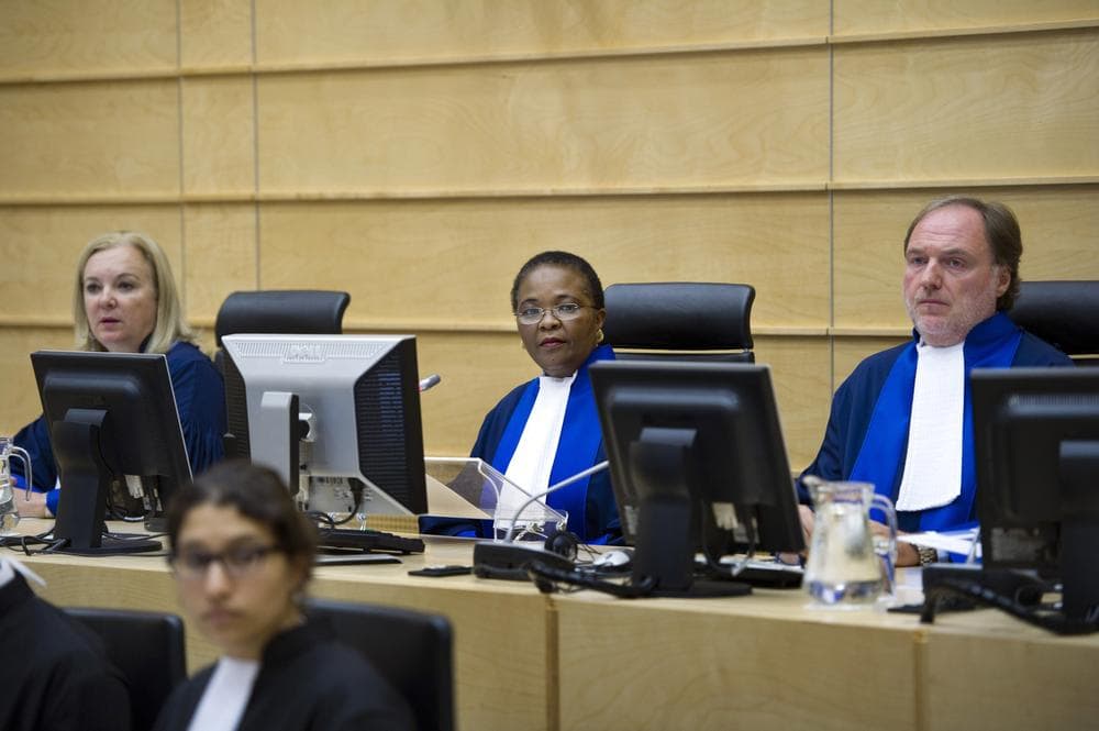 LEFT TO RIGHT Judges Sylvia Steiner, Sanji Mmasenono Monageng and Cuno Tarfusser, back row, from left, in the courtroom in The Hague, Netherlands, Monday. The International Criminal Court (ICC) has issued arrest warrants for Libyan leader Moammar Gadhafi, his son and his intelligence chief for crimes against humanity in the early days of their struggle to cling to power. (AP)