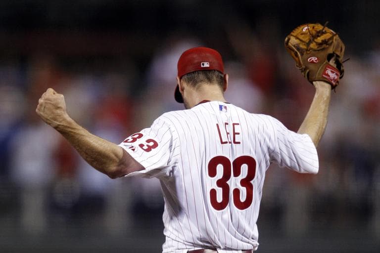 Philadelphia Phillies pitcher Cliff Lee celebrates after beating the Red Sox 5-0 Tuesday. (AP)