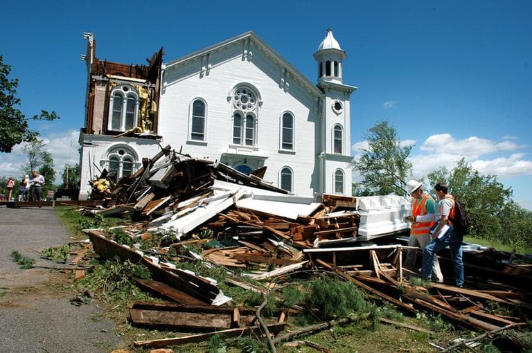 Owners of the First Church of Monson &mdash; seen here in 2011 after the tornado hit &mdash; are still working to replace the toppled steeple. (Robin Lubbock/WBUR)