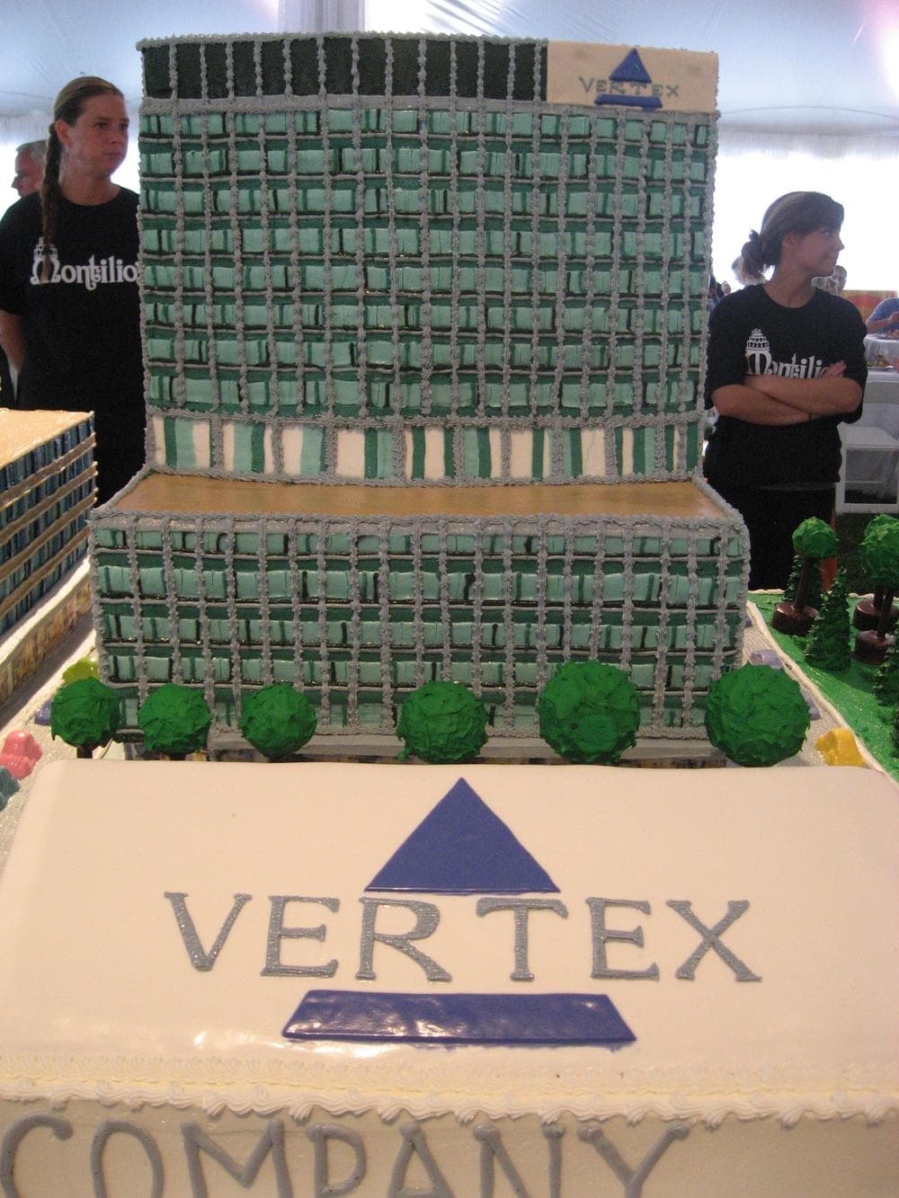 The groundbreaking fanfare included a baked cake model of Vertex's new corporate headquarters. (Curt Nickisch/WBUR)
