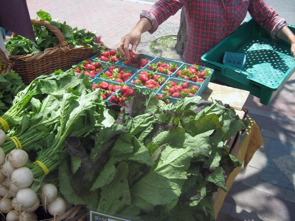 Though it's still not summer, many farmers markets still feature plenty of fresh local fruits and vegetables. (Meghna Chakrabarti/WBUR)