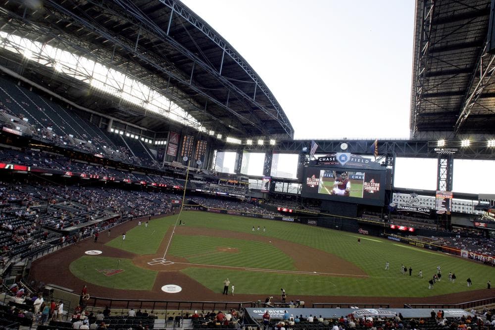 The roof opens at Chase Field prior to an MLB baseball game between the Arizona Diamondbacks and the San Francisco Giants in June.  The MLB All Star Game will be held at the field in mid July. (AP)
