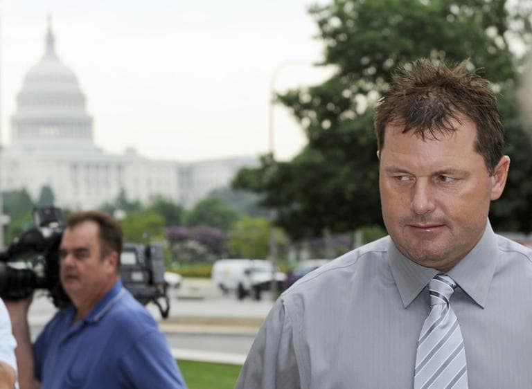 With the Capitol in the background, former Red Sox pitcher Roger Clemens arrives at federal court in Washington, Wednesday, for his trial on charges of lying to Congress. (AP)