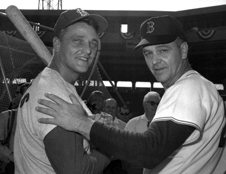 Boston Red Sox manager Dick Williams, right, and Roger Maris, of the St. Louis Cardinals, chat before Game 2 of the 1967 World Series in Boston. (AP)