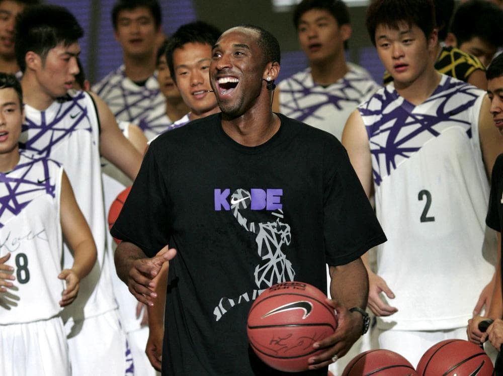 Kobe Bryant coaches young Chinese players during a basketball clinic in Shanghai, China in 2009. Bryant and his agent are rumored to be planning a basketball tour in China in order to pass the time during the NBA lockout. (AP)