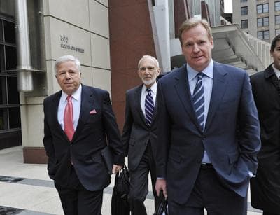 New England Patriots owner Robert Kraft, left, and NFL Commissioner Roger Goodell, right, leave the federal courthouse along with NFL outside attorney Bob Betterman April 14. (AP)