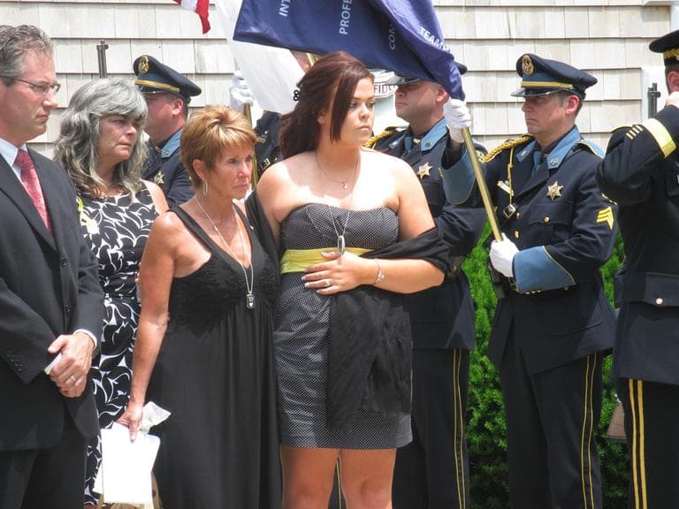 Army Sgt. Matthew Gallagher&#39;s mother, Cheryl Ruggiero, left, stands next to his wife, Katie, at his funeral, Thursday. (Fred Thys/WBUR)
