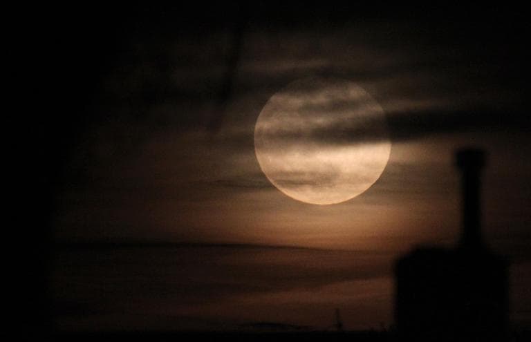 The transformation from human into a werewolf is often associated with the appearance of the full moon. (AP)