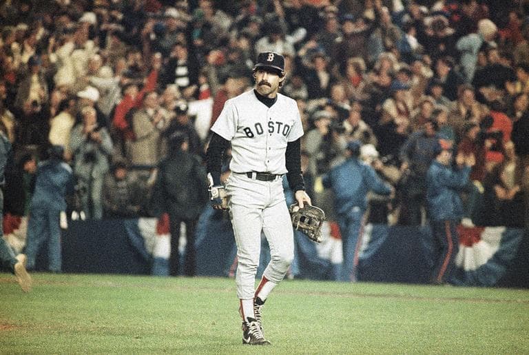 Buckner, dejected, walks off the field after committing an error in Game 6 of the 1986 World Series. (AP)