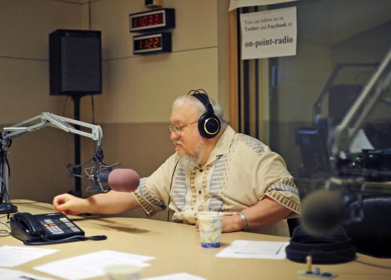 Author George R. R. Martin speaks with Tom Ashbrook in the studios of WBUR. (Alex Kingsbury/WBUR)