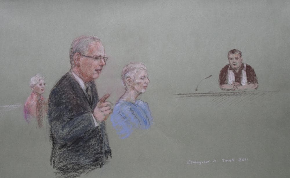 Catherine Greig, center, sits in court next to her attorney while a former Bulger associate, Kevin Weeks, testifies. (Margaret Small for WBUR)