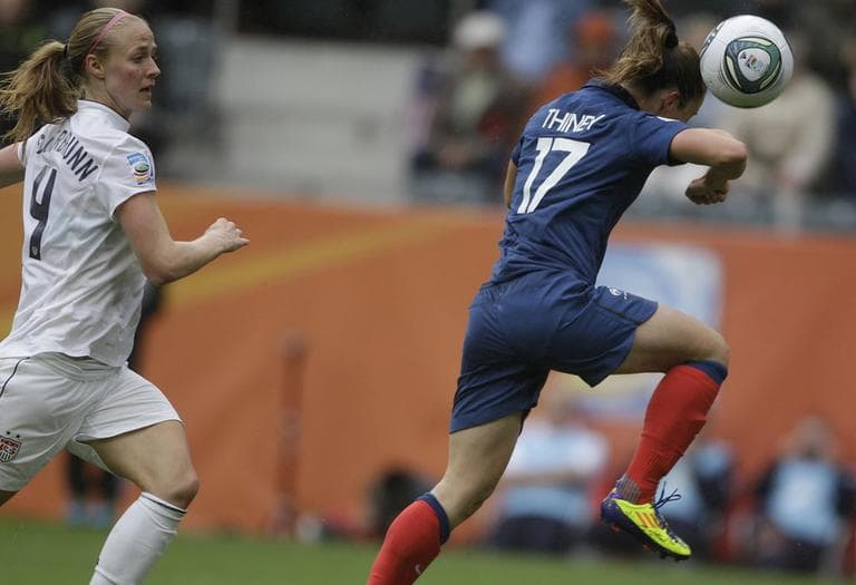 France&#039;s Gaetane Thiney, right, jumps for the ball during the semifinal match between France and the United States at the Women’s Soccer World Cup in Germany on Wednesday. (AP)
