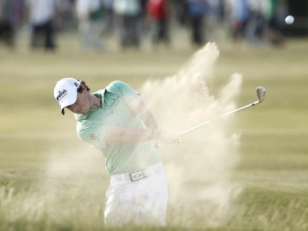 Northern Ireland's Rory McIlroy plays a shot during the second day of the British Open at Royal St George's golf course in England on Friday. (AP)