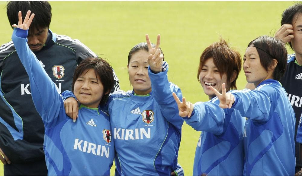 Members of Japan's national women's soccer team pose during practice Friday. (AP)