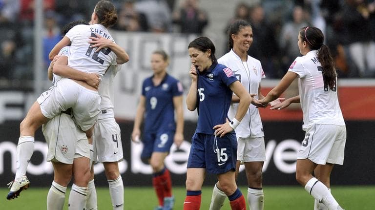 U.S. players celebrate winning 3-1 the semifinal match between France and the United States at the Women’s Soccer World Cup. (AP)