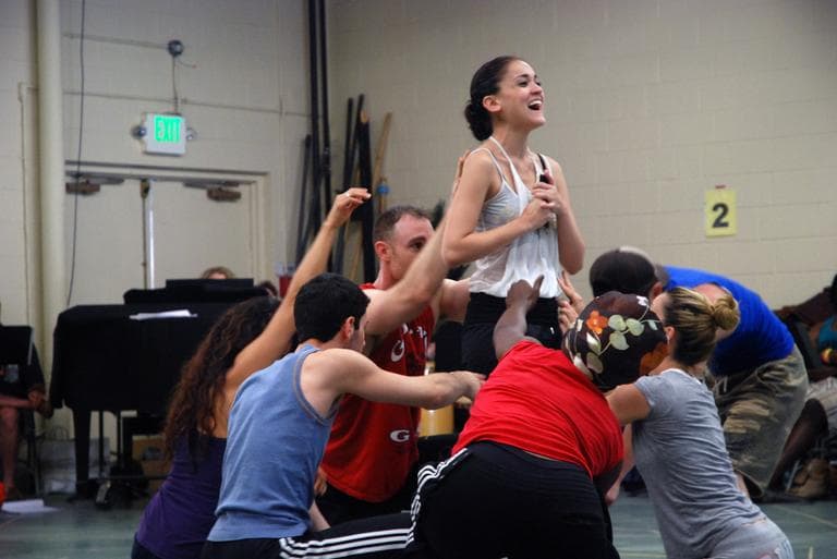 Gross and castmembers rehearse a scene from &quot;Tarzan.&quot; (Andrea Shea/WBUR)