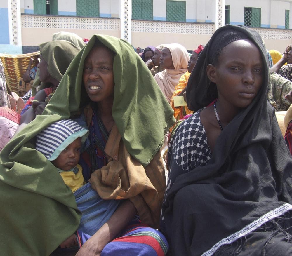 Somali women wait to receive rations at a camp in Mogadishu, Somalia. (AP)