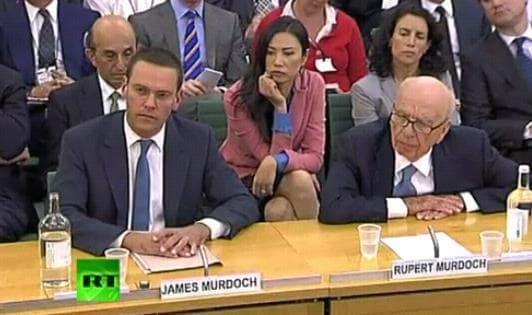 James Murdoch, Wendy Murdoch and Rupert Murdoch during parlimentary testimony. (Photo Courtesy of Russia Today)