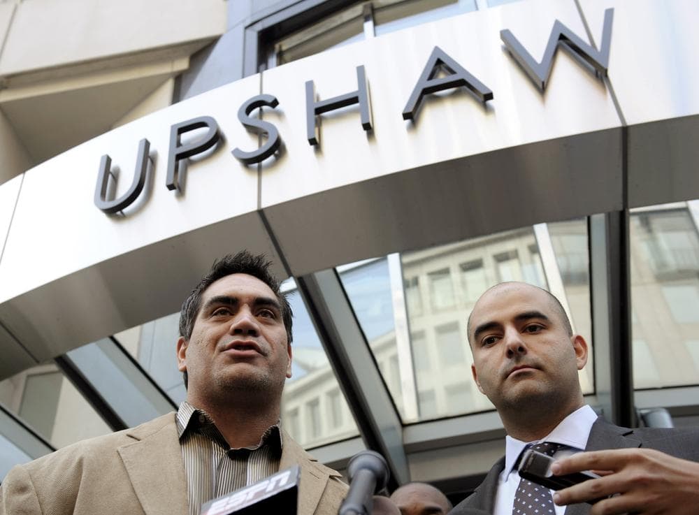NFL Players Association President Kevin Mawae and spokesman George Atallah outside the Players Association offices in Washington.  (AP)